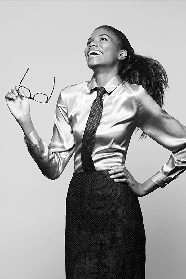 Vision session with a black woman smiling in black and what photography